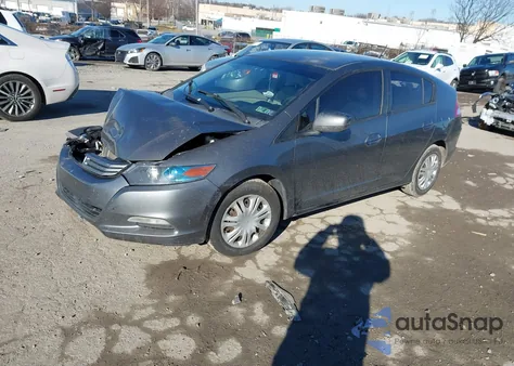 2011 Honda Insight from USA, damaged, VIN JHMZE2H31BS008200